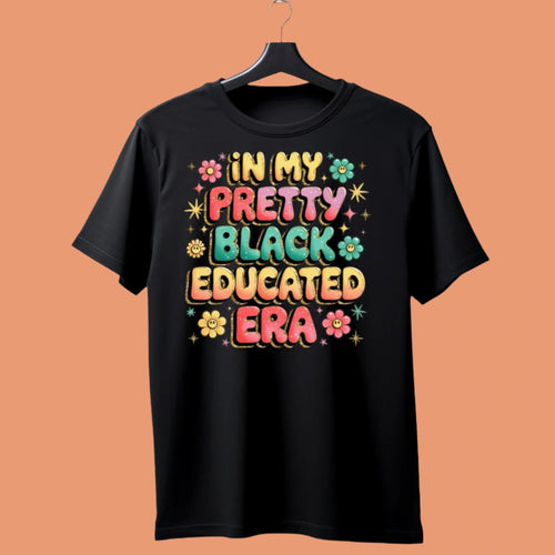 In My Pretty Black Educated Era shirt with bright design celebrating Black academic pride.